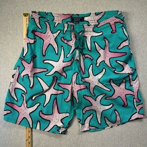 Vilebrequin mesh lined swim shorts. Green with starfish design. XXL.